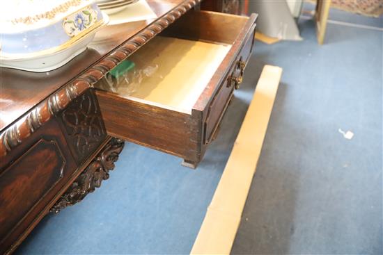 A late Victorian Chippendale style mahogany serving table, table W.4ft 6in. D.2ft 2in. H.3ft; cupboards W.1ft 9in. D.2ft 2in. H.6ft